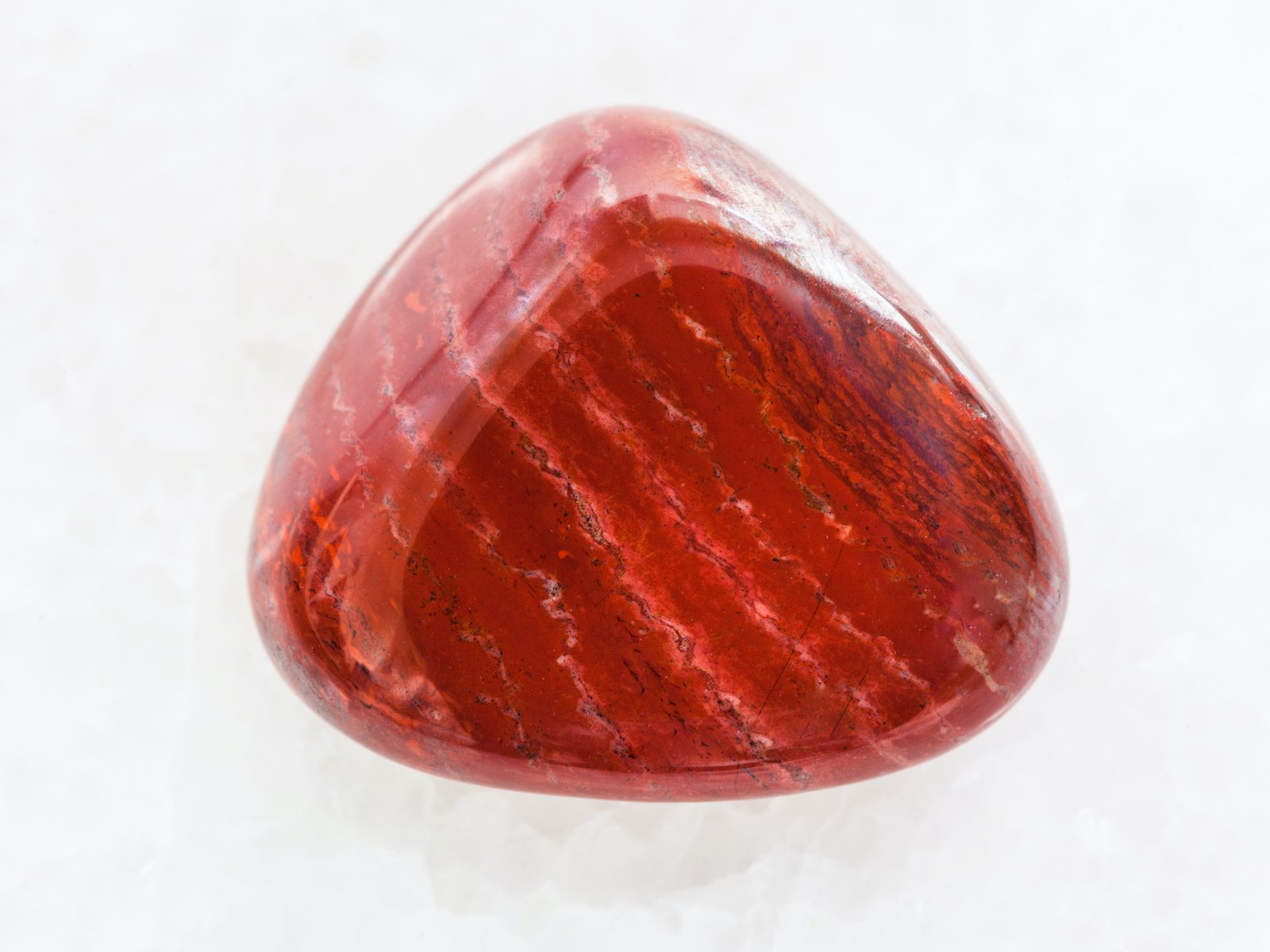 a tumbled red jasper stone