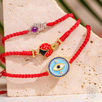 HAMSA Hand of Protection - Bracelet à cordes rouges à quatre brins