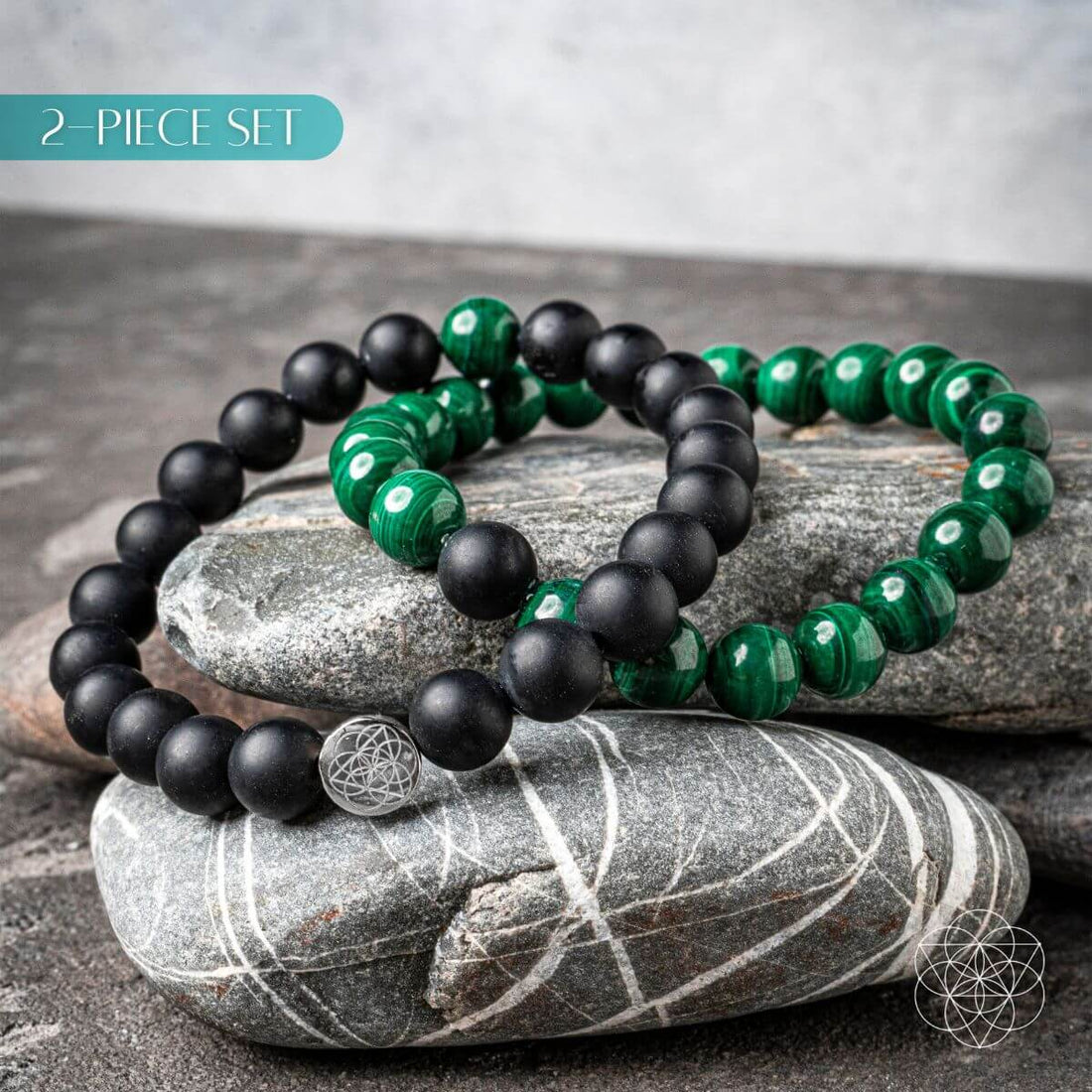 Steady Mind - Malachite &amp; Onyx Double Bracelet, two bracelets resting on grey stones