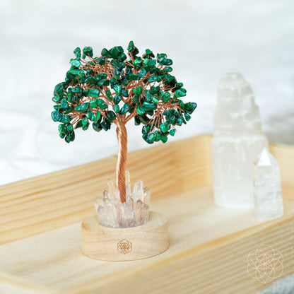 Unwind - Malachite Tree Lamp, a green malachite crystal tree with clear quartz at the base