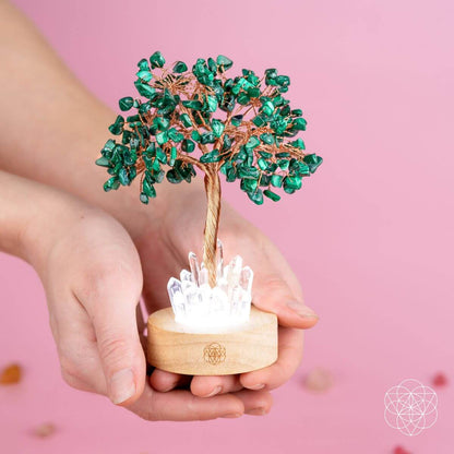 Unwind - Malachite Tree Lamp, a green malachite crystal tree with clear quartz at the base